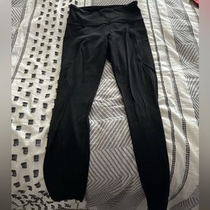 Athleta leggings black with side pockets size small